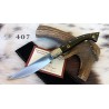 Coltello tipo pattadese elaborato, lama 11 cm, manico a coda di rondine in corno di bufalo con anima in acciaio + pin