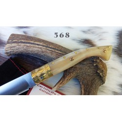 Coltello tipo pattadese, lama 11 cm, manico a coda di rondine in corno di montone con anima in acciaio + pin